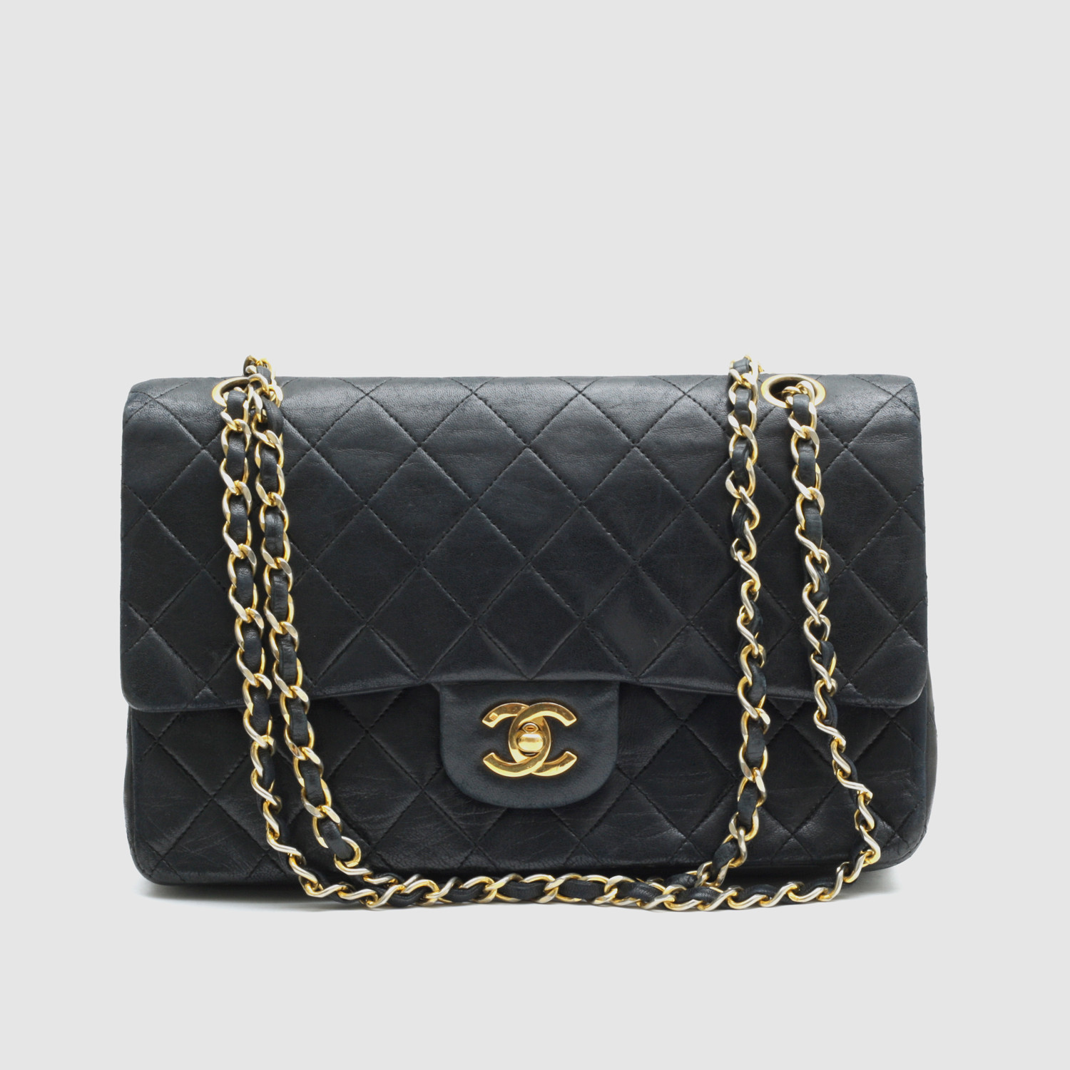 Chanel Classic Flap Bag // Black Quilted Lambskin - Vintage Luxury Handbags - Touch of Modern