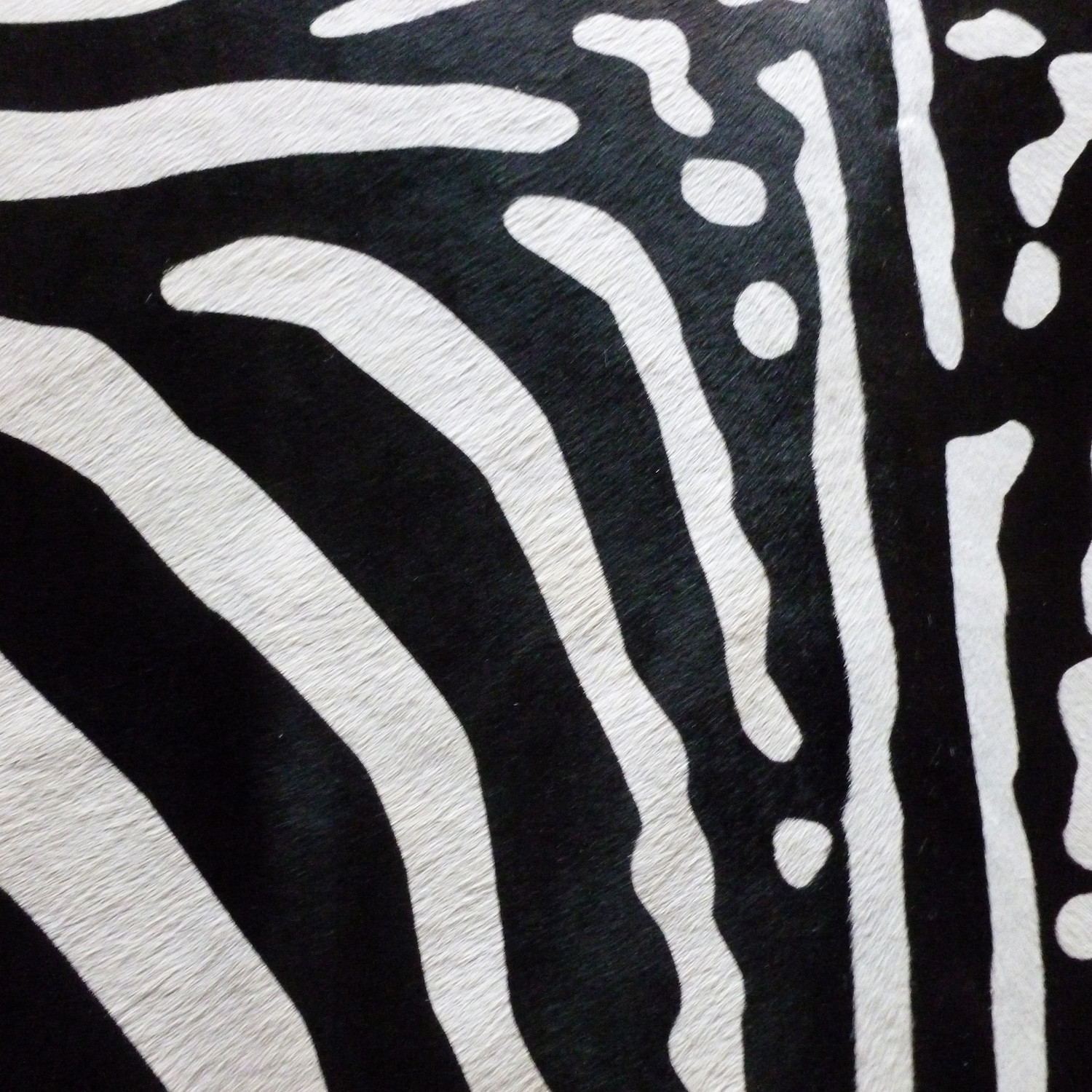 Reverse Stenciled Zebra // Cowhide Rug Chesterfield Leather Touch