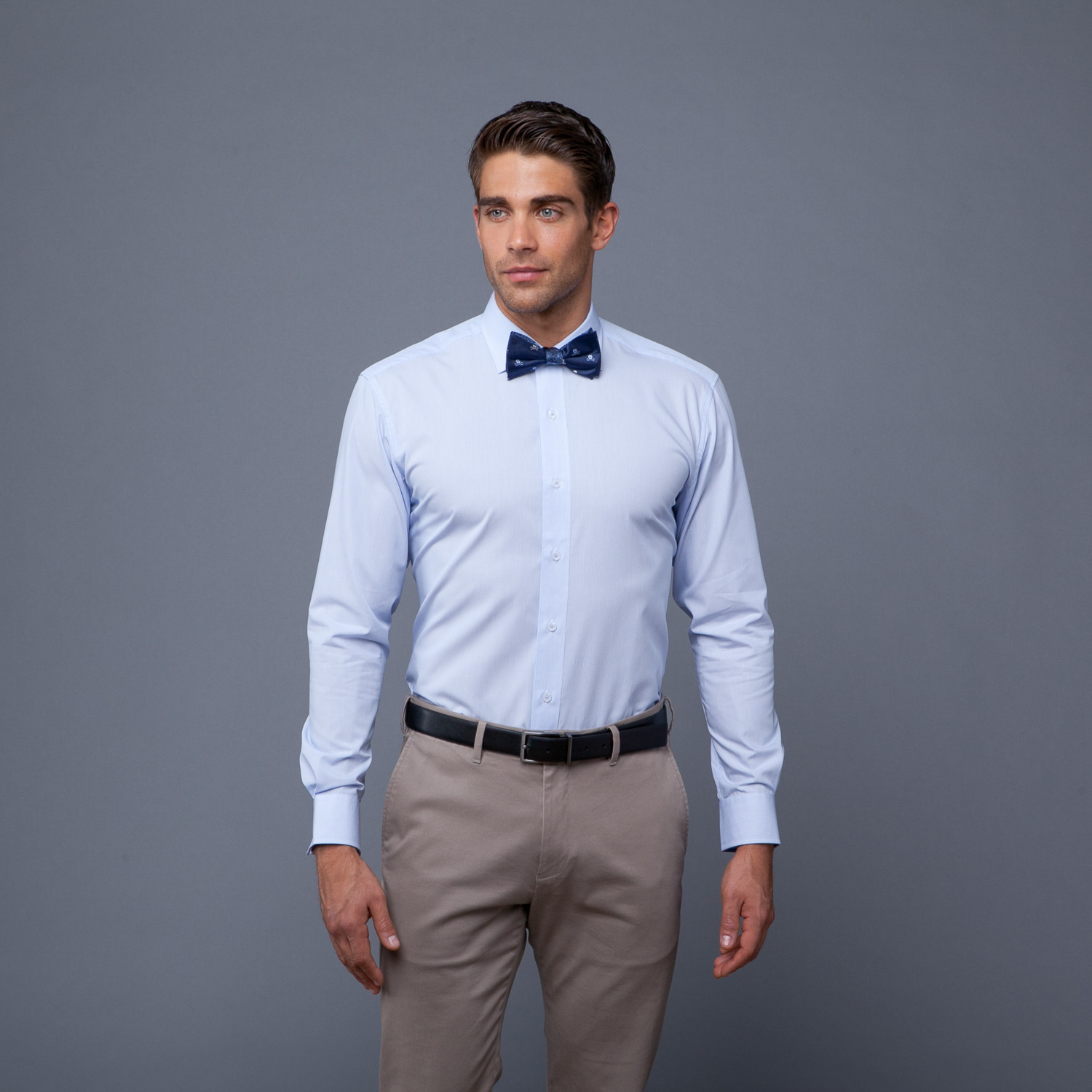 blue shirt with bow tie