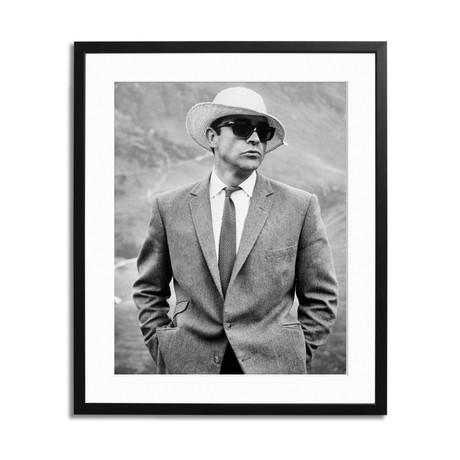 Sean Connery Wears Straw Hat and Sunglasses (12"L x 16"H)