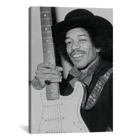 A Smiling Jimi Hendrix Holding His Guitar (26"W x 18"H x 0.75"D)