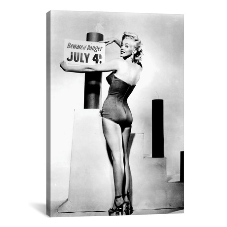 Marilyn Monroe With A 4th Of July Sign // Globe Photos, Inc.