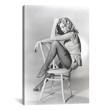 Anita Ekberg Sitting On A Chair In Classic Portrait // Movie Star News