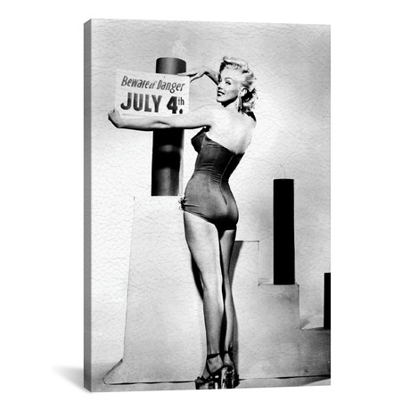 Marilyn Monroe With A 4th Of July Sign // Globe Photos, Inc.
