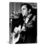 Johnny Cash Playing Guitar // Globe Photos, Inc.