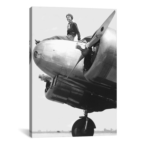Amelia Earhart Atop Airplane