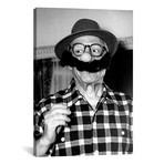 Pablo Picasso Holding Funny Mask // Globe Photos, Inc.