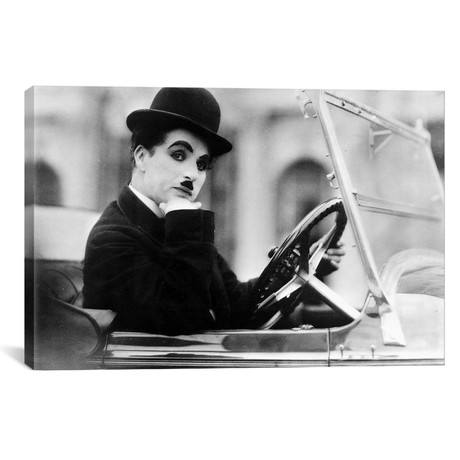 Charlie Chaplin Riding In Vehicle // Movie Star News (18"W x 26"H x 0.75"D)