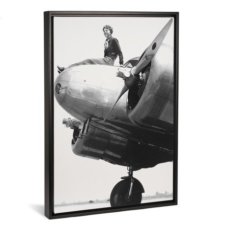 Amelia Earhart Atop Airplane // The New York Times