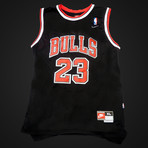 Chicago Bulls // Michael Jordan + Team Signed Chicago Bulls Black Jersey // Museum Frame (Signed Jersey Only)
