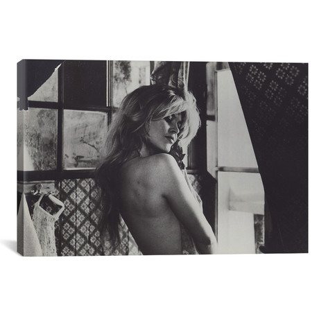 Brigitte Bardot Pin-up Topless, Holding Sheet // Globe Photos, Inc.