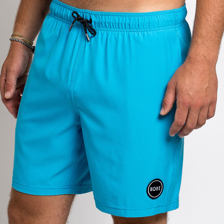 18" Nomad 4-Way Stretch Swim Trunks // Cyan (S)