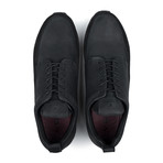 Solo Trainer // Black (UK 11)