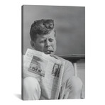 President John F Kennedy Smoking A Cigar And Reading The Newspaper // John Parrot (12"W x 18"H x 0.75"D)