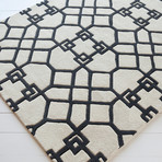 Davel Hand-tufted Contemporary Rug (5' x 7')