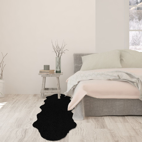 Faux Fur // Animal Shaped // Black Rug (2'W x 3'L)