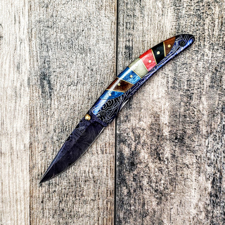 Colored Spacer Ionized Damascus Folder