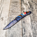 Colored Spacer Ionized Damascus Folder