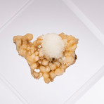 Stilbite With Scholesite Floating in Acrylic Display