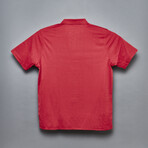 Performance Polo // Rio Red (M)