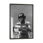 Head Gear Wearing Muhammad Ali In The Corner Between Rounds by Muhammad Ali Enterprises (26"H x 18"W x 0.75"D)