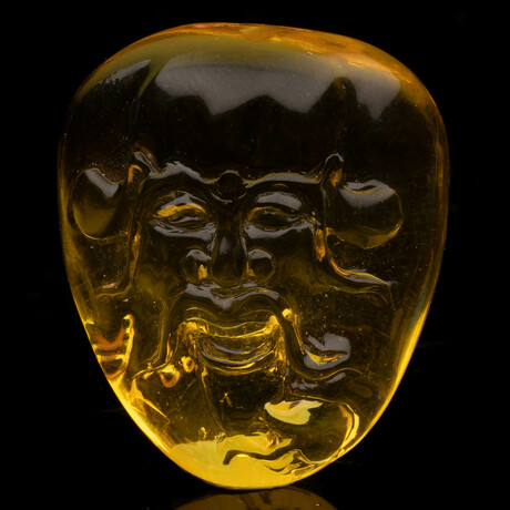 Carved Amber Celtic God // 7.61 Grams
