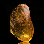 Carved Floral Amber Pendant // 8.60 Grams