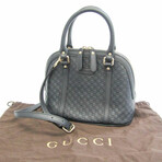 Gucci // MicroGuccissima Handbag // Navy // Pre-Owned