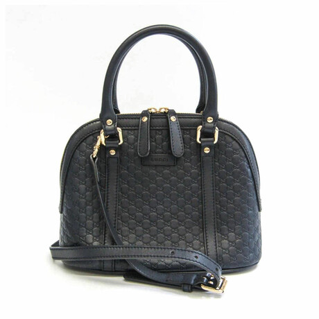Gucci // MicroGuccissima Handbag // Navy // Pre-Owned