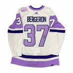 Patrice Bergeron // Boston Bruins // Autographed "Hockey Fights Cancer" Jersey