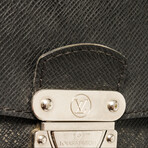 Louis Vuitton // Belaia Clutch