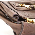 Louis Vuitton // Petillante Clutch Monogram Empreinte // Brown