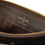 Louis Vuitton // Petillante Clutch Monogram Empreinte // Brown