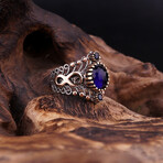 Infinity Ring with Round Sapphire (4.5)