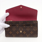 Louis Vuitton // Monogram Portefeuille Sara Fuschia Wallet