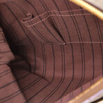 Louis Vuitton // Petillante Clutch Monogram Empreinte // Brown