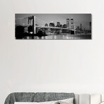 Illuminated Brooklyn Bridge With Lower Manhattan's Financial District Skyline In The Background In B&W, New York City, New York  by Panoramic Images (12"H x 36"W x 1.5"D)