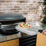 Everdure KILN 2 Burner Pizza oven with Rotating Stone  + Everdure KILN Pizza Oven Cover + Everdure KILN Pizza Peel + Everdure KILN Pizza Cutter/Rocker // Graphite