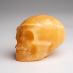 Genuine Polished Orange Calcite Skull Carving // 127.4 g