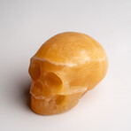 Genuine Polished Orange Calcite Skull Carving // 127.4 g