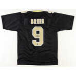 New Orleans Saints // Drew Brees Signed Jersey + Archie Manning Signed 8x10 Photo