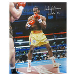 Michael Moorer // Boxing Gold Trunks Action // Signed 16x20 Photo
