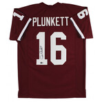 Stanford Cardinal // Jim Plunkett Signed Jersey & Tony Hill Signed Helmet