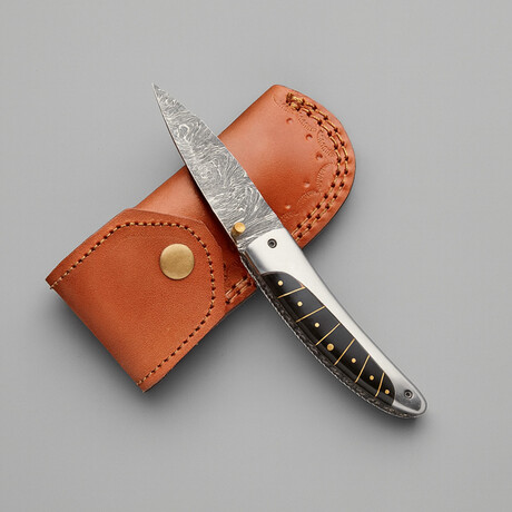 The Nexus N22 // Drop Point // Black Bull Horn Spacers & Brass