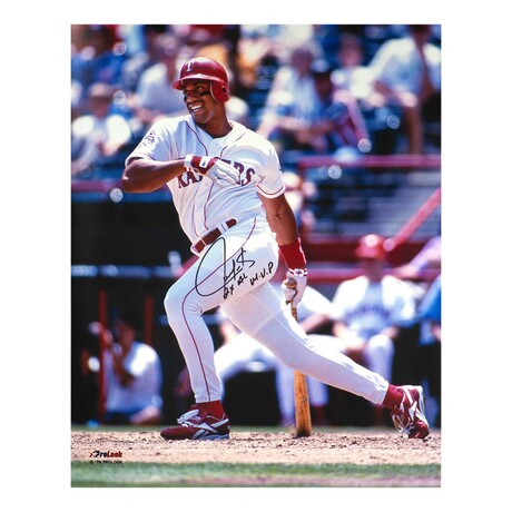 Juan Gonzalez // Texas Rangers // Signed White Jersey Swinging Action Photo