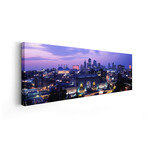 Union Station at sunset with city skyline in backgroundKansas City, Missouri, USA by Panoramic Images (12"H x 36"W x 1.5"D)