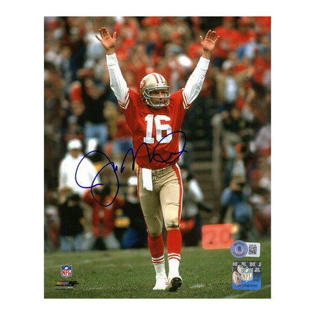 Joe Montana // SF 49ers // Signed Arms Raised Red Jersey Photo