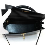 Hermès // Box Calf Leather Kelly 28 Handbag // Black + Gold // Pre-Owned